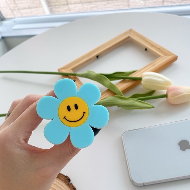 スマホリング 韓国 スマホグリップ おしゃれ グリップトック スマイル ニコちゃん 花 フラワー 個性的 かわいい スマホスタンド Griptok の通販はau Pay マーケット セレクトショップオンリーユー