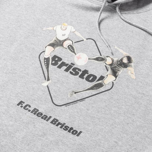 F.C.Real Bristol エフシーレアルブリストル パーカー グレー サイズ:詳細参照(M位) | STRASSENKICKER キャプテン翼 ポドルスキ 日向小次郎 スウェットパーカー (LUKAS HYUGA TWIN SHOOT HOODIE) | トップス フーディー プルオーバー | コラボ【メンズ】【中古】【K4534】