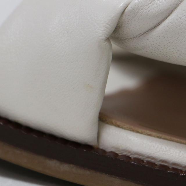 Cole Haan コール ハーン サンダル ホワイト 白 サイズ:7 1/2(24.5cm) | 24春夏 スリップオン サンダル | ANICA LUX SLIDE | フラット ブレイド クッション レザー | イタリア製 | シューズ 靴【レディース】【中古】【K4555】