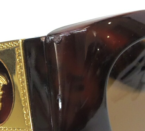 ジャンニヴェルサーチ GIANNI VERSACE 黒眼鏡 べっ甲柄 メデューサ 赤銅色 【中古】(61904)