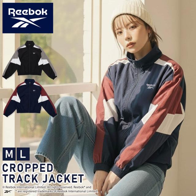 Reebok リーボック ナイロンジャケット レディース クロップド ショート丈 トラックジャケット 軽量 防風 春 秋 冬 フルジップ ブルゾン おしゃれ スポーツウェア ブランド ワンポイントロゴ オーバーサイズ ゆったり アウター 上着 黒 Ｍ L LL 2025fw Karlas別注