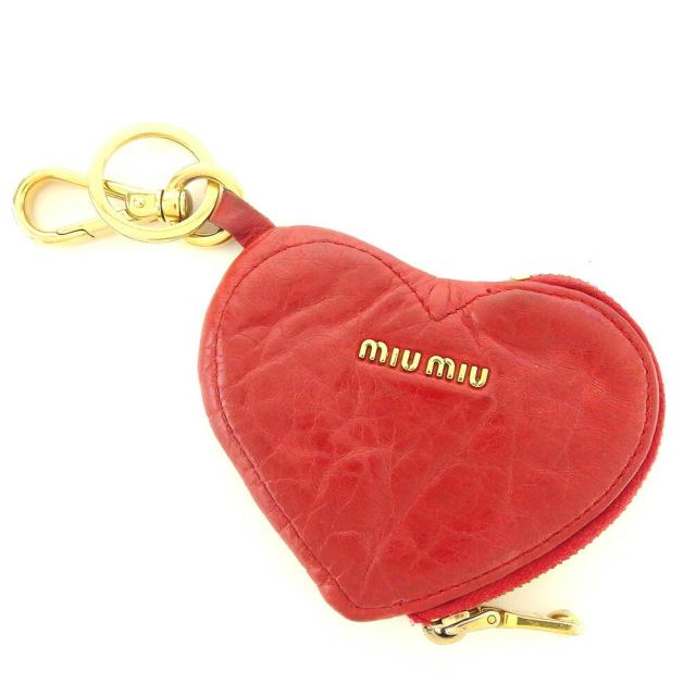 【BIGお買い物ラリー★30%OFFセール中】ミュウミュウ MIUMIU ケースハート ストーン＆スタッズ付き レッド ゴールド シルバー レディース 中古