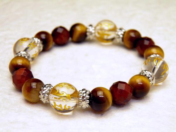 1玉7文字金彫り梵字ブレスレット 水晶12mm・タイガーアイ・レッドタイガーアイの通販は 7,084円