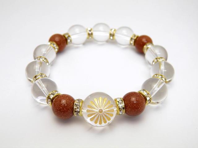 『菊紋章』金彫り 16mm 水晶 ゴールドストーン ブレスレット 送料無料 風水 パワーストーンの通販は 8,052円