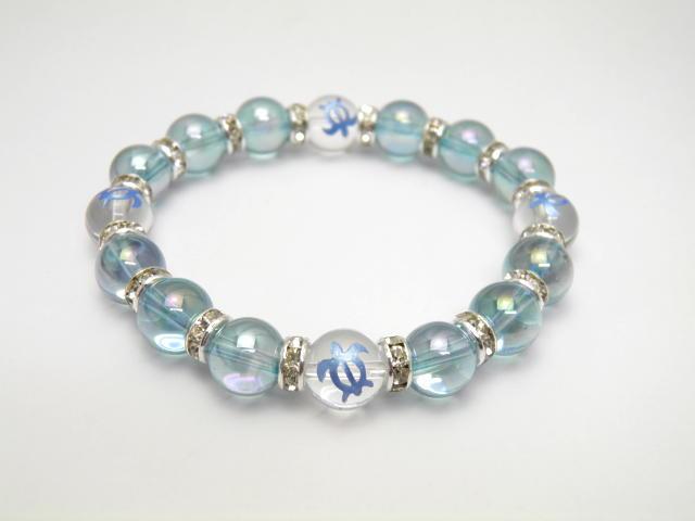 ホヌ 水晶 ブルー 彫刻 アクアオーラ 銀ロンデル ブレスレット パワーストーンの通販は