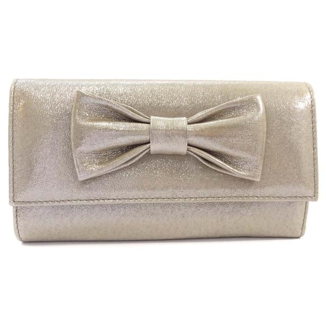 中古 美品 Dolce Gabbana ドルチェアンドガッバーナ リボンモチーフ 長財布 三つ折り財布 レディース メタリックトープグレー レの通販はau Pay マーケット ゴールドエコ