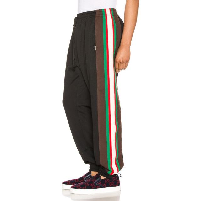 green and black track pants