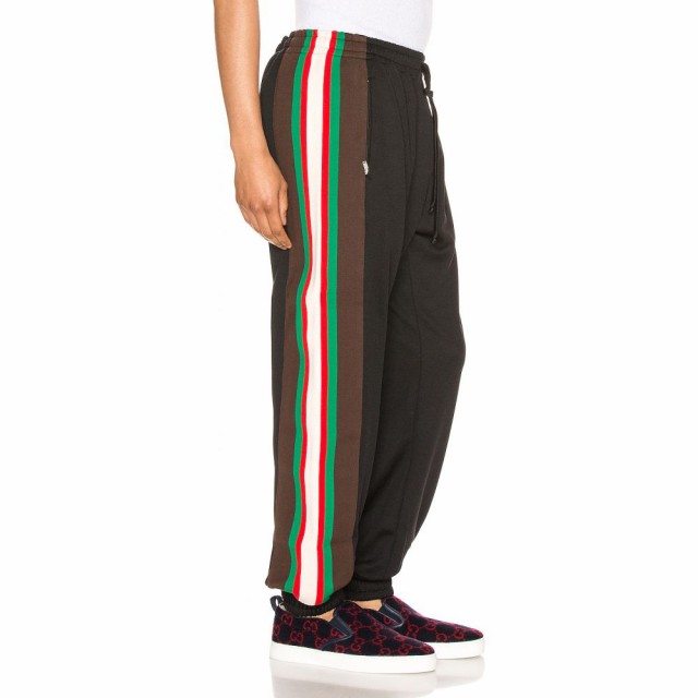 green and red track pants
