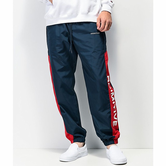 navy and red track pants