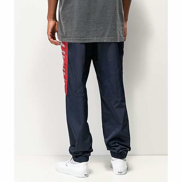 navy and red track pants