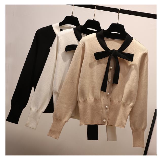 リボン付き ハイウエストスリムカーディガン レディース リボン カーディガン ハイウエスト ガーリー きれいめ 上品 パールボタン 黒 白 の通販はau Pay マーケット Solare Shop