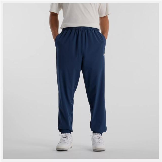 ニューバランス ウィンドブレーカーパンツ メンズ Newbalance ウーブントラックジョガーパンツ ロングパンツ 吸汗速乾 ドライ トレーニングパンツ ウインドブレーカー スポーツウェア 男性用 ネイビー 紺 長ズボン ずぼん 服 ブランド アパレル/AMP51205-NNY