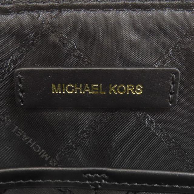 マイケル教科課程 Michael Kors  ロゴタイプ  クラッチペダル御徒面子 帆布 レディース  中古