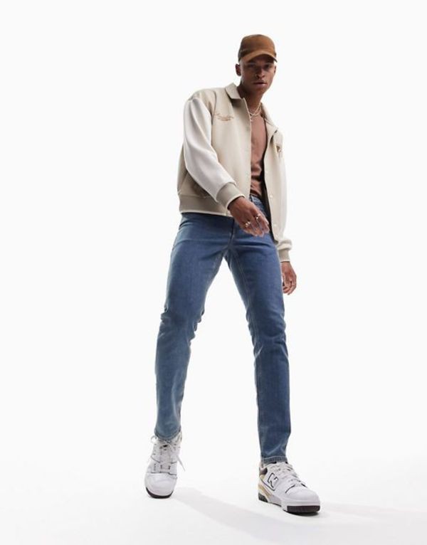 エイソス メンズ デニムパンツ ボトムス ASOS DESIGN slim jeans in flat mid wash blue Blueの通販は 11,980円