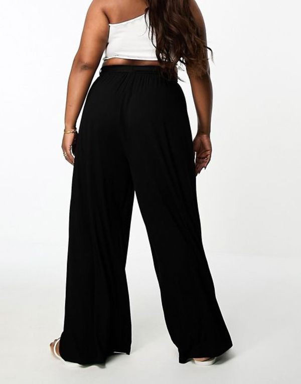 エイソス レディース カジュアルパンツ ボトムス ASOS DESIGN Curve tie belt wide leg pants in black Black