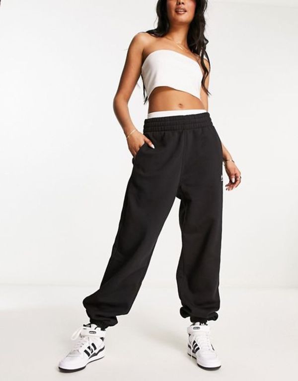 アディダス レディース カジュアルパンツ ボトムス adidas Originals sweatpants in black Black