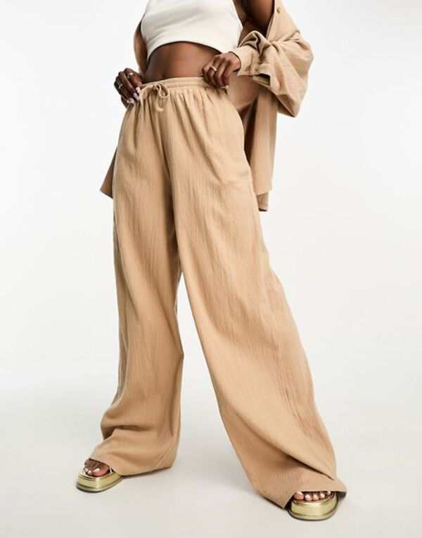 エイソス レディース カジュアルパンツ ボトムス ASOS DESIGN crinkle shirred waist wide leg pants in stone - part of a set Stone