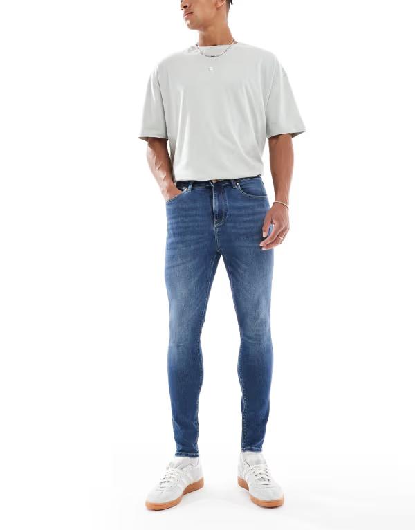 エイソス メンズ デニムパンツ ボトムス ASOS DESIGN power stretch jeans in dark wash blue DARK WASH BLUEの通販は