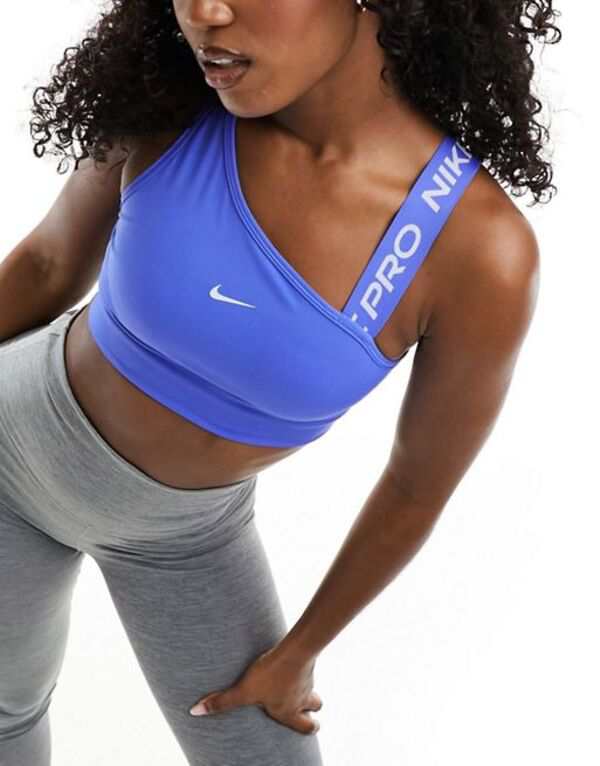 ナイキ レディース ブラジャー アンダーウェア Nike Pro Training swoosh asymmetric sports bra in blue MBLUE