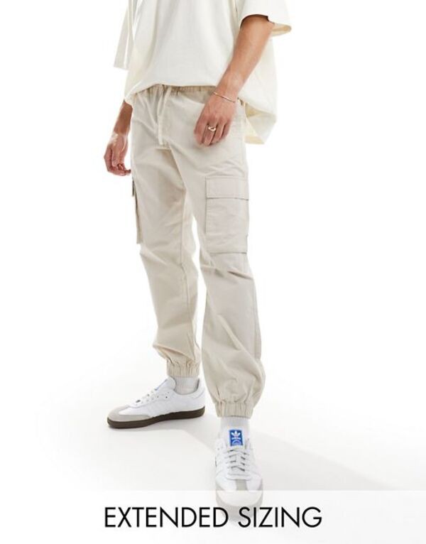 エイソス メンズ カジュアルパンツ ボトムス ASOS DESIGN tapered pull on pants in stone Stoneの通販は