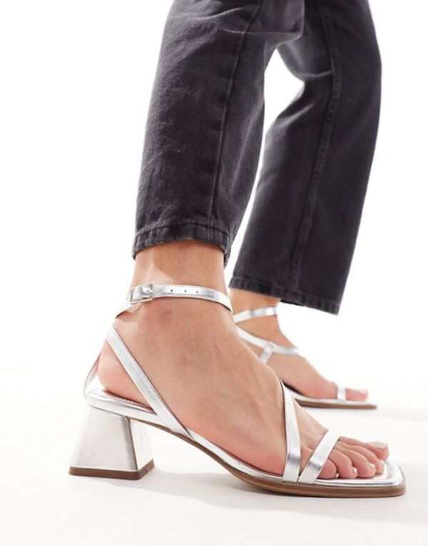 エイソス レディース サンダル シューズ ASOS DESIGN Hibiscus asymmetric mid block heeled sandals in silver SILVER