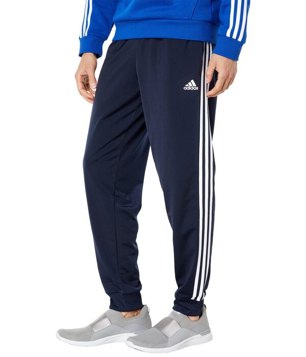 アディダス メンズ カジュアルパンツ ボトムス Essentials 3-Stripes Tricot Jogger Pants Legend Ink/Whitの通販は