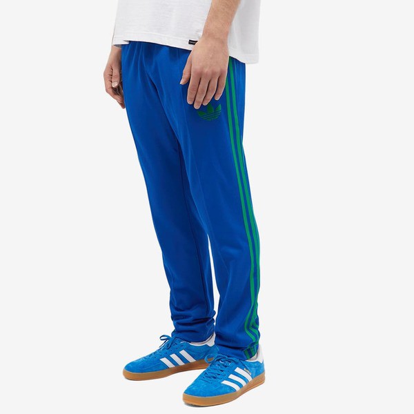 アディダス メンズ カジュアルパンツ ボトムス Adidas Adicolor 70s Striped Track Pant Collegiate  Royal