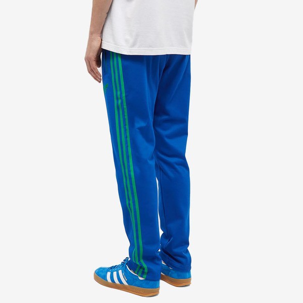 アディダス メンズ カジュアルパンツ ボトムス Adidas Adicolor 70s Striped Track Pant Collegiate  Royal