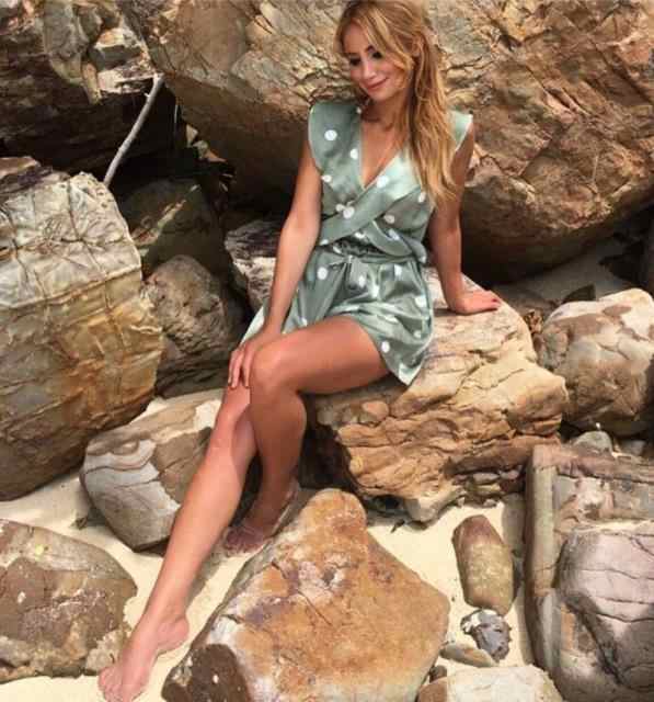 green polka dot jumpsuit