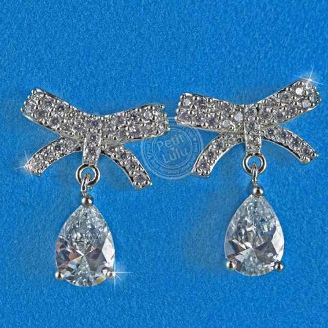 ピアス レディース リボン リボンピアス しずく ダイヤモンドCZ 18K フープ 揺れる シルバー925の通販はau PAY マーケット -  カジュアルアクセサリショップのプチルル