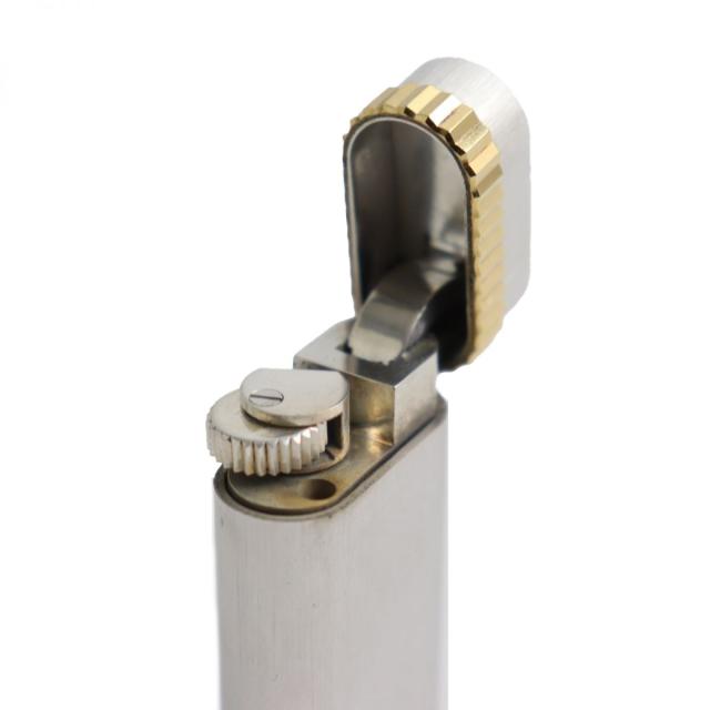 美品●Cartier カルティエ オーバル ヘアライン ローラー式 ガスライター シルバー×ゴールド スイス製 メンズ 着火確認済みの通販は