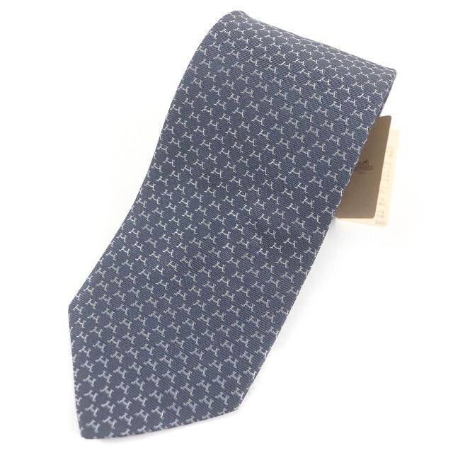 未使用品□HERMES エルメス 2022年製 HILARIO シルク100％ Hロゴ総柄 レギュラータイ ネクタイ ネイビー 箱付き フランス製 メンズの通販は 16,060円