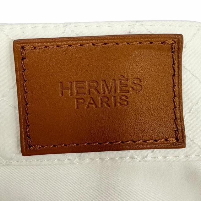 未使用品◇HERMES エルメス 2025年製 5E0356DQ コットン セリエボタン ロゴレザーパッチ付 スカート ホワイト 36 イタリア製 レディース