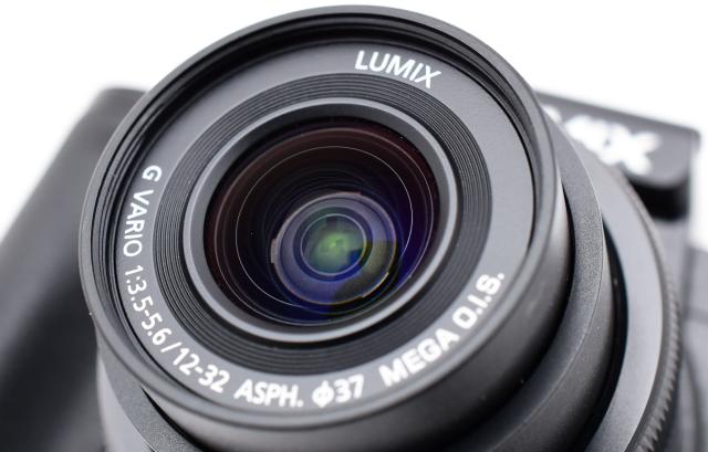 パナソニック ミラーレス Panasonic LUMIX DC-G100V 標準ズームレンズキット 中古 トライポッドグリップ＆新品SDカード付き 届いてすぐに使える 美品の通販は