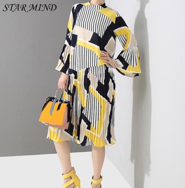 送料無料 ワンピース プリーツ アシンメトリー フレア Aライン 幾何学模様 おしゃれ トレンド 流行 総柄 膝丈 膝下 ミモレ丈 袖フレアの通販はau Pay マーケット Star Mind