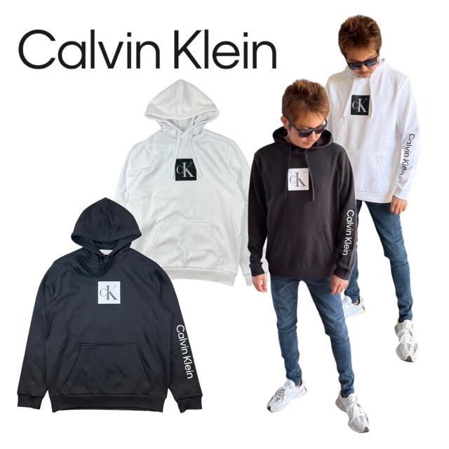 カルバンクライン Calvin Klein トップス パーカー 40QC401 フーディ スウェット プリントロゴ 裏起毛 ユニセックス CALVIN KLEIN TRAVELING MONOGRAM HWの通販は