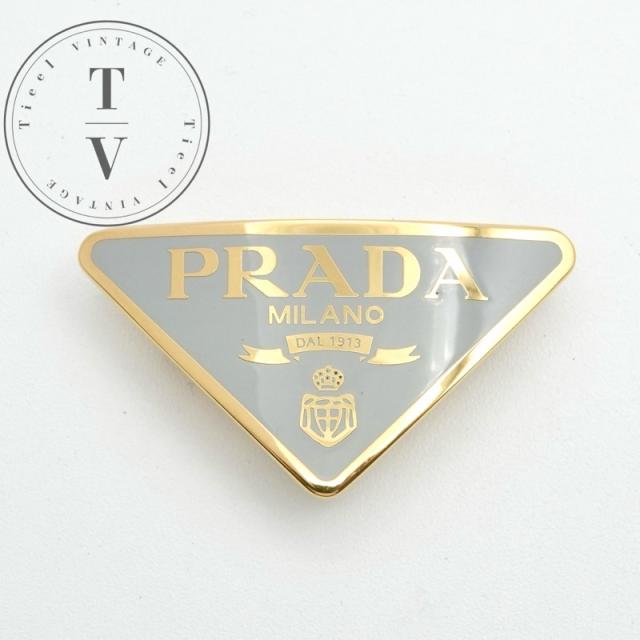 プラダ PRADA ヘアアクセサリー ゴールド グレー トライアングルロゴ