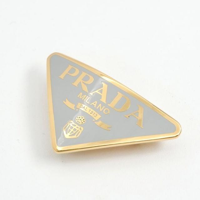 プラダ PRADA ヘアアクセサリー ゴールド グレー トライアングルロゴ バレッタ ヘアクリップ_1