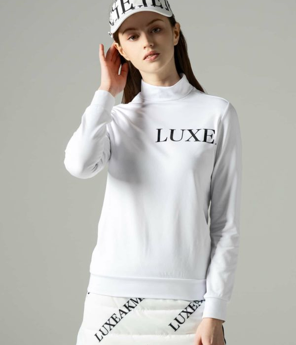 LUXEAKMPLUS リュクスエイケイエムプラス 光沢ロゴモックネックTシャツ 長袖 ゴルフ レディース 女性 GOLF スポーツ おしゃれ LUXEAKMPLUS リュクスエイケイエムプラス 光沢ロゴモックネックT