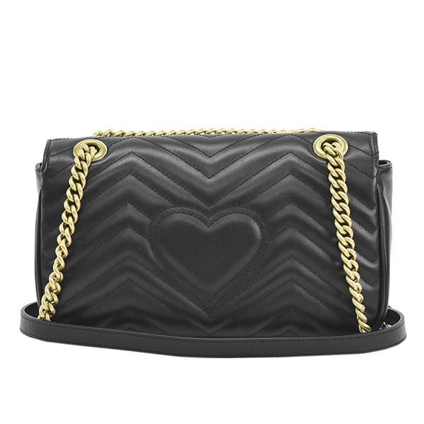 gucci purse with heart on back