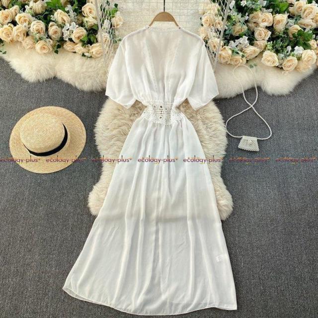 旅行撮影のホリデードレスの女神ファンシンジくり抜かれたウエストは細く、Vネックのロングカーディガン日焼け止めジャケット