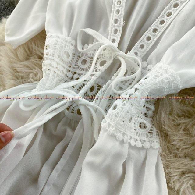 旅行撮影のホリデードレスの女神ファンシンジくり抜かれたウエストは細く、Vネックのロングカーディガン日焼け止めジャケット