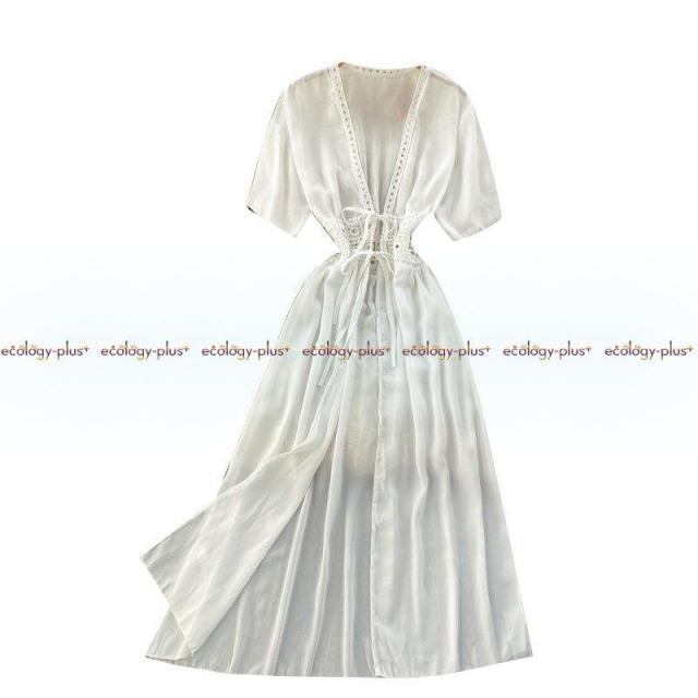 旅行撮影のホリデードレスの女神ファンシンジくり抜かれたウエストは細く、Vネックのロングカーディガン日焼け止めジャケット