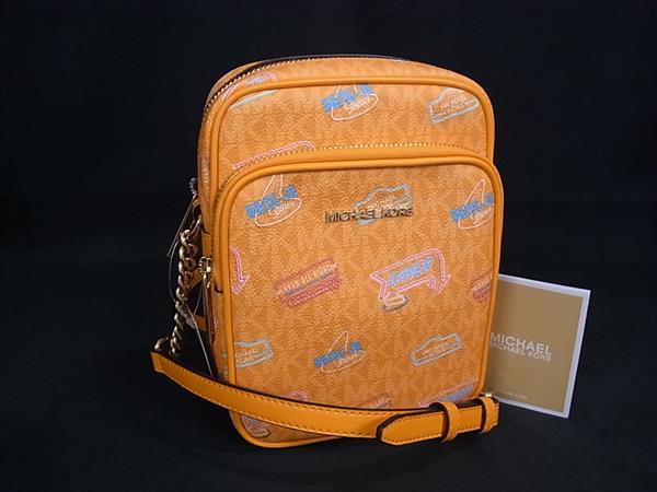 ■新品■未使用■ MICHAEL KORS マイケルコース 35T5GTVC2I JET SET TRAVEL MK柄 PVC ショルダーバッグ 斜め掛け オレンジ系 BP6393