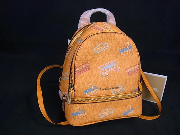 ■新品■未使用■ MICHAEL KORS マイケルコース RHEA エクストラスモール MK柄 PVC リュックサック バックパック オレンジ系 BP6399