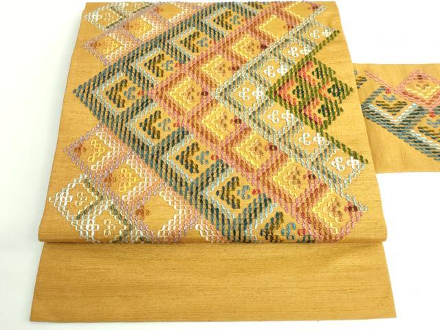 平和屋着物■極上　本場琉球　読谷山花織　紬地　九寸名古屋帯　櫨染色地　逸品　DZAB0700kh5