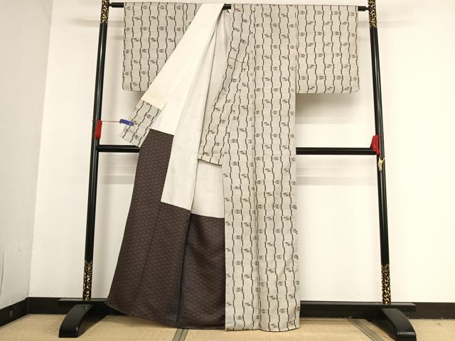 平和屋着物○重要無形文化財 本場久米島紬 ゆうな染 手織 正絹