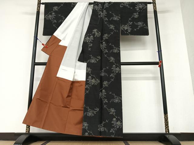 平和屋着物○上質な紬 萬葉の詩 黒地 反端付き 正絹 逸品