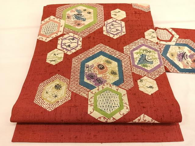 平和屋着物●全通柄　九寸名古屋帯　生紬地　型染め　亀甲宝尽くし花文　正絹　逸品　BAAU1758hv