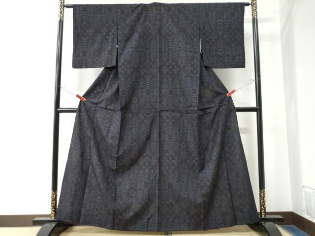 平和屋着物○本場結城紬 重要無形文化財 80亀甲 飛び亀甲柄 間